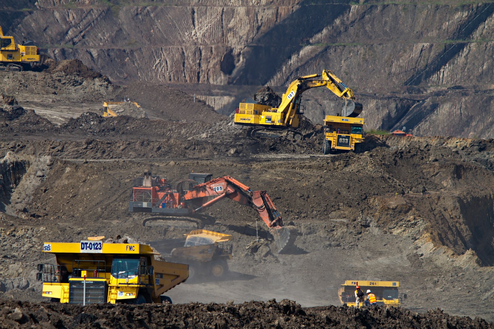 Open-pit mining excavators and haul trucks working the Copperbelt