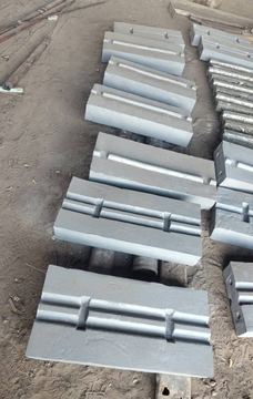 Grey iron liner segments, cast and primed, in the SKS Steel Zambia yard