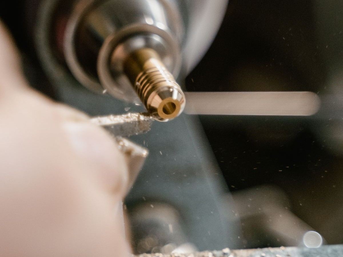 Bronze bush being machined on a lathe