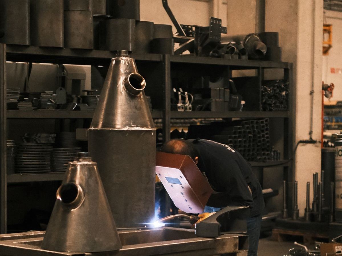 Cone-shaped steel component fabrication, representative of cone and bowl liners